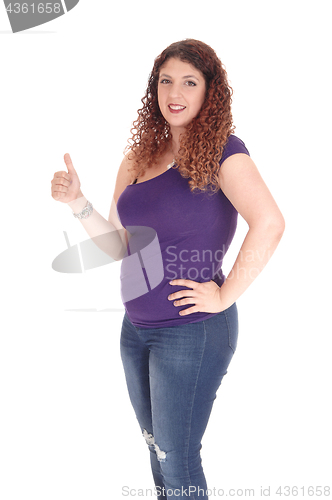 Image of Curvy woman standing in profile with thump up