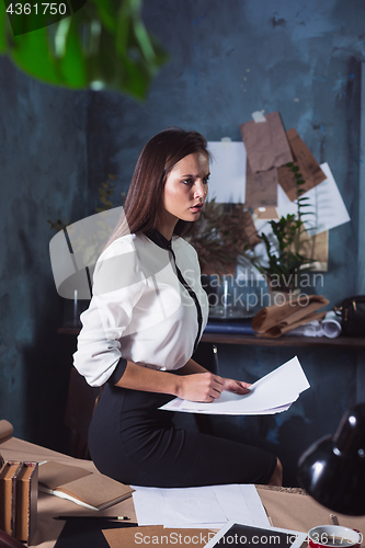 Image of Portrait of a businesswoman who is working at office