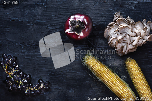 Image of Organic vegetables on wooden table. Top view