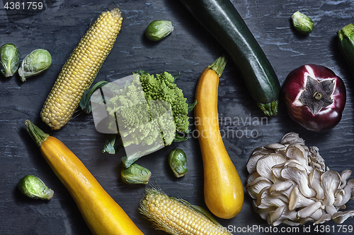 Image of Organic vegetables on wooden table. Top view