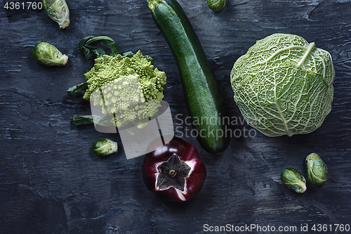 Image of Organic vegetables on wooden table. Top view