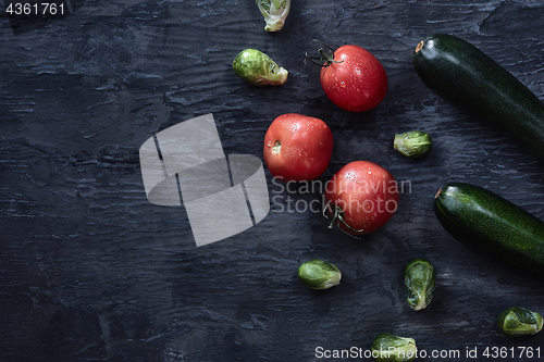 Image of Organic vegetables on wooden table. Top view