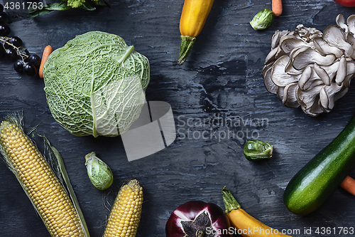 Image of Organic vegetables on wooden table. Top view