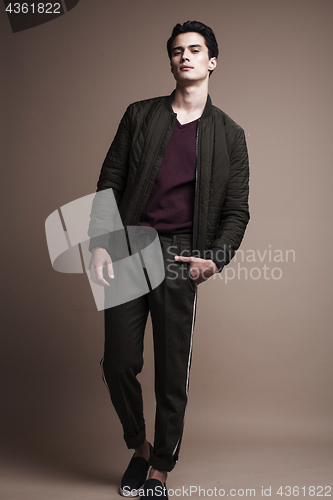 Image of handsome fashion looking man posing in studio, lifestyle modern people concept