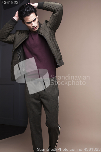 Image of handsome fashion looking man posing in studio, lifestyle modern people concept