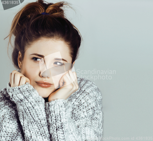 Image of beauty young real woman in sweater at winter warmed up, cheerful