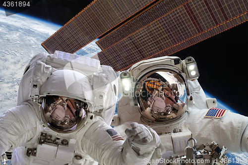 Image of International Space Station and astronaut.