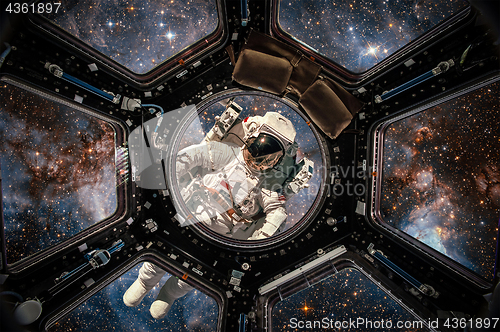Image of International Space Station and astronaut.