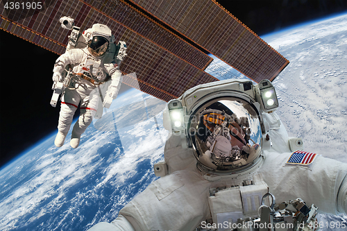 Image of International Space Station and astronaut.