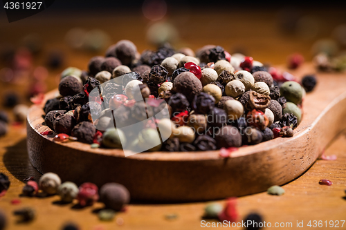 Image of Mixed peppercorns. Dry mix peppercorns close up