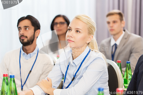 Image of happy business team at international conference