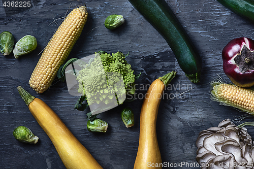 Image of Organic vegetables on wooden table. Top view