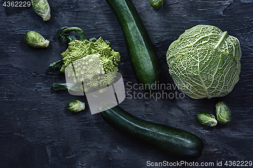 Image of Organic vegetables on wooden table. Top view