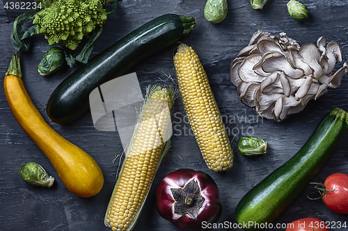 Image of Organic vegetables on wooden table. Top view