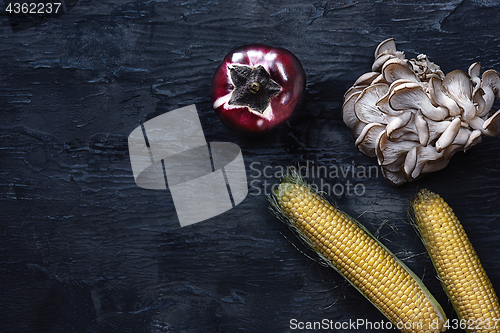 Image of Organic vegetables on wooden table. Top view