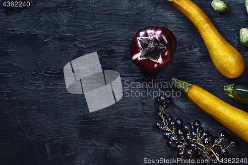 Image of Organic vegetables on wooden table. Top view