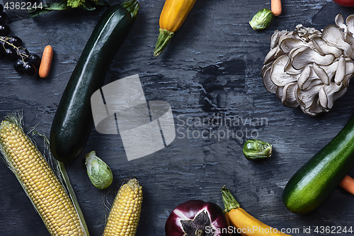 Image of Organic vegetables on wooden table. Top view