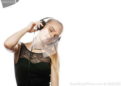 Image of young sweet talented teenage girl in headphones singing isolated