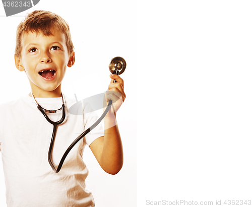 Image of little cute boy with stethoscope playing like adult profession d