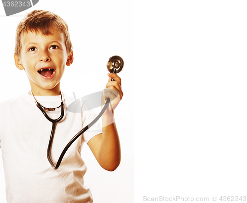 Image of little cute boy with stethoscope playing like adult profession d