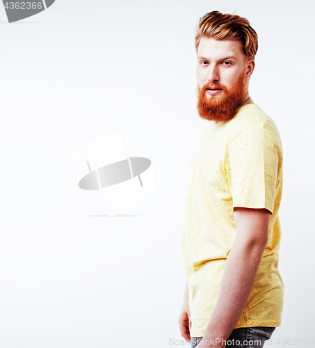 Image of young handsome hipster ginger bearded guy looking brutal isolate