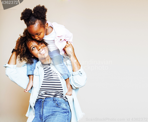 Image of adorable sweet young afro-american mother with cute little daugh