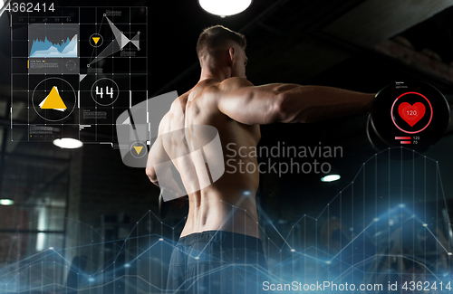 Image of close up of man with dumbbells exercising in gym