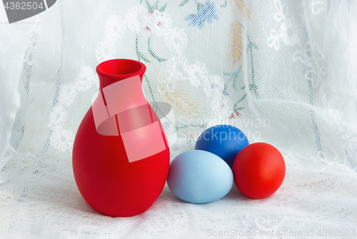 Image of Three Easter Eggs And A Jug On A Lace