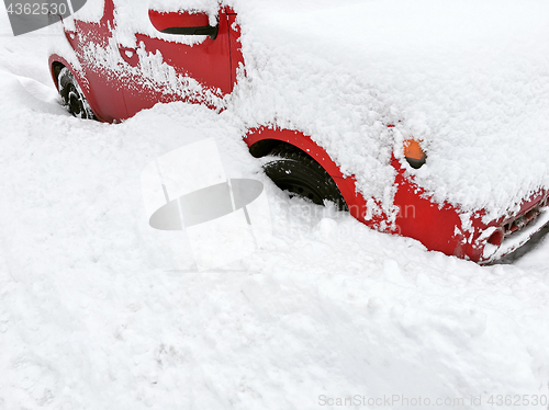 Image of Red car in white snow