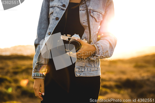 Image of Woman Taking Picture Outdoors