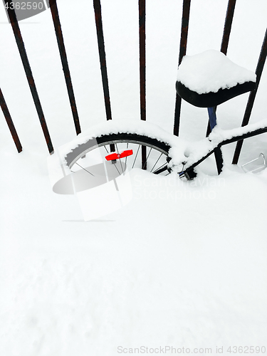 Image of Bicycle deep in snow