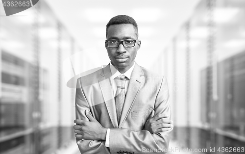 Image of Young black man in server room