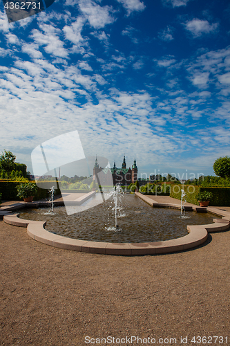 Image of A fountain in the beautiful parkland around the great castle Fre