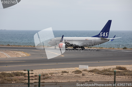 Image of ARECIFE, SPAIN - APRIL, 15 2017: Boeing 737-700 of SAS ready to 