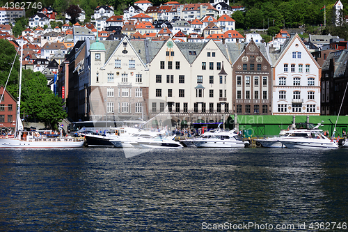 Image of BERGEN HARBOR, NORWAY - MAY 27, 2017: Private boats on a row alo