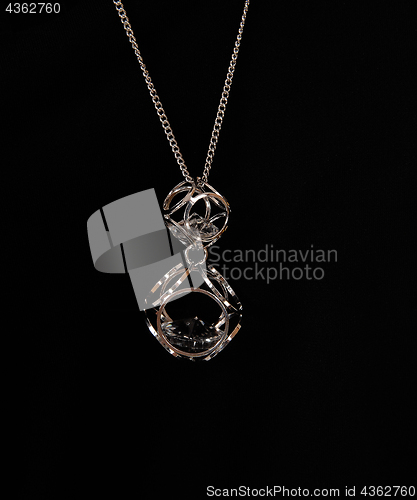 Image of Beautiful necklace over black background