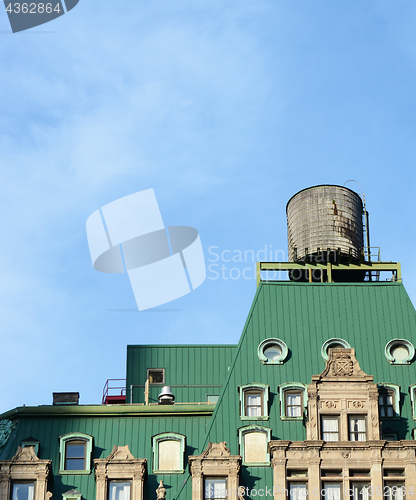 Image of Water tower on the rooftop of a New York building