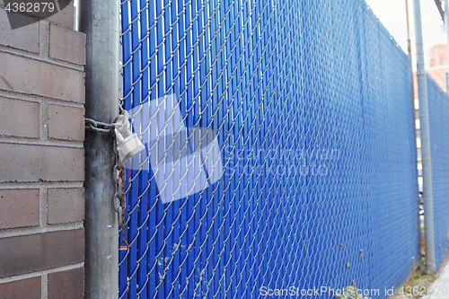 Image of Security gate secured with a heavy padlock