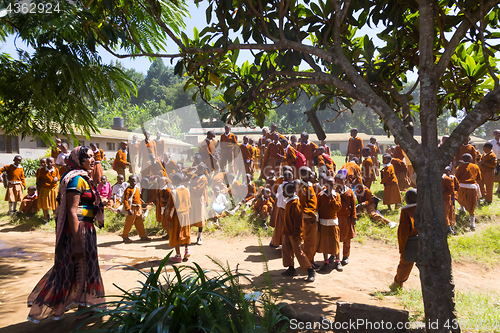 Image of Children in uniforms playing in the cortyard of primary school in rural area near Arusha, Tanzania, Africa.