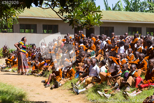 Image of Children in uniforms playing in the cortyard of primary school in rural area near Arusha, Tanzania, Africa.