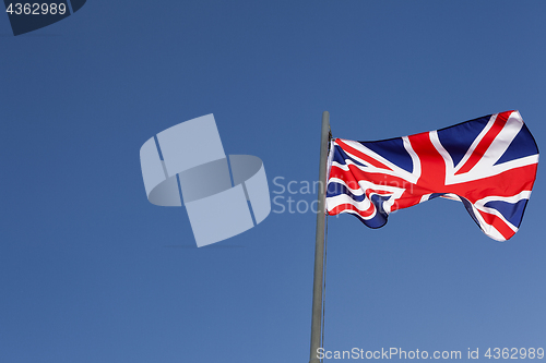 Image of UK flag on a flagpole