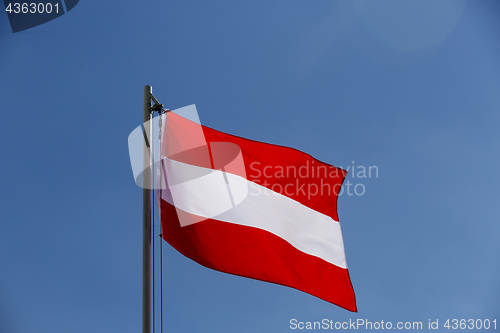 Image of National flag of Austria on a flagpole