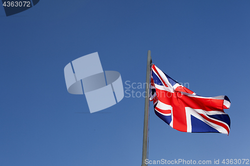 Image of UK flag on a flagpole