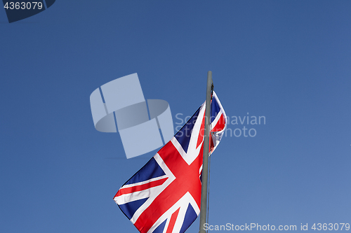 Image of UK flag on a flagpole