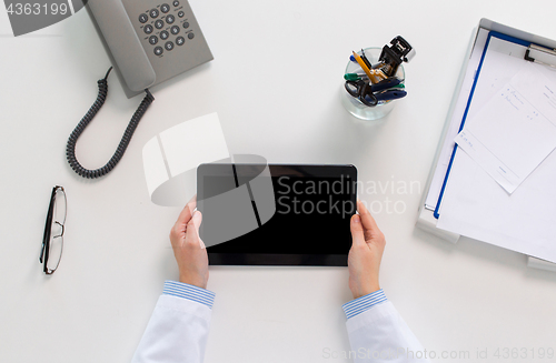 Image of doctor hands with tablet pc at clinic