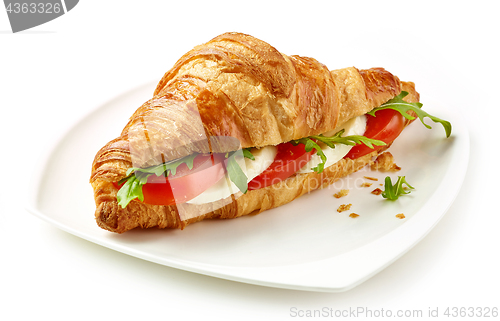 Image of croissant sandwich with tomato and mozzarella
