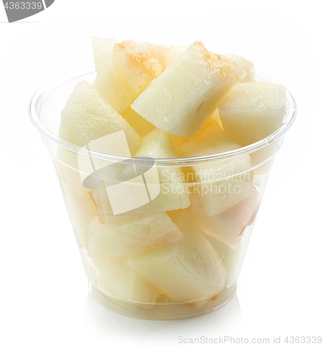 Image of fresh melon pieces salad in plastic cup