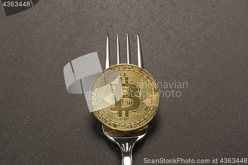 Image of Bitcoin Fork Concept Dark Gray Background