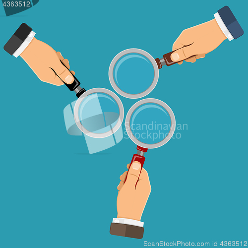 Image of Magnifying Glass in Hands