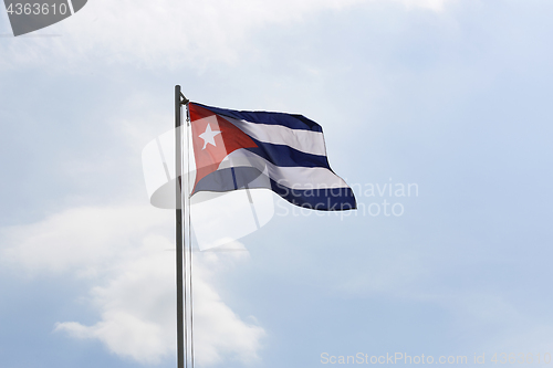 Image of National flag of Cuba on a flagpole